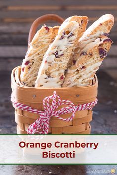 a basket filled with cranberry shortbreads on top of a table