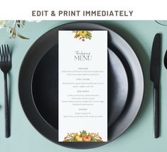 an empty menu on a black plate next to utensils and flowers with the words edit & print immediately