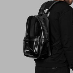 Stay organized in style with the Brand New, 'Blvck Liquid Backpack'. Featuring a minimalist silhouette and a considered layout to keep all your essentials organized, it's the perfect accessory to elevate your lifestyle. Made from black transparent PVC and the straps are made from luxurious Saffiano leather, the Blvck Transparent Backpack is designed to last a lifetime. All our backpacks are handmade with care, giving each a unique character and ensuring maximum quality. The front pocket is desig Blvck Paris, Transparent Backpack, Clear Backpack, Minimalist Silhouette, Streetwear Accessories, Traditional Fashion, Stay Organized, Bagpack, Shades Of Black