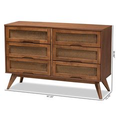 the sideboard is made from wood and has wicker panels on it, as well as