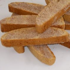 several pieces of bread stacked on top of each other with powdered sugar on them