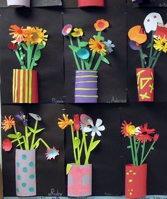 flowers in vases made out of paper on a blackboard with writing underneath them