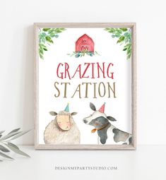 a sign that says grazing station with two sheep wearing party hats and a barn in the background