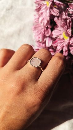 "bell hooks ♀️ 925 sterling silver hammered band ring with a rose quartz stone  ♀️ Finish: Hammered ♀️ Stone Size: 7.5 mm ♀️ Nickel free ♀️ Free shipping in the US \"The function of art is to do more than tell it like it is- it's to imagine what is possible.\"  -- bell hooks ABOUT ROSE QUARTZ Rose quartz is often called the \"Love Stone.\" It's energetic hallmark is that of unconditional love that opens the heart chakra. This makes rose quartz a stone for every type of love: self-love, family, p Bell Rose, Chunky Silver Rings, Silver Wrap Ring, Hammered Silver Ring, Hammered Band, Hammered Rings, Rose Quartz Stone, Rose Quartz Gemstone, Pink Gemstones