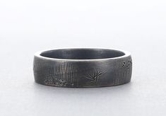 This beautiful one of a kind rustic band is custom hand fabricated from recycled silver and measures 6mm. The silver is oxidized to bring out the texture, and can either be a light oxidation or very dark if you prefer. The feel is quite substantial and comfortable without being too thick or heavy.    Because each ring is made to order, the color and texture will differ slightly, making a ring uniquely created just for you. Please allow one week for production time. Please contact us if you do no Rustic Silver Rings With Patina, Making A Ring, Antler Pendant, Be A Light, Recycled Silver, Horse Hair, Beautiful One, One Week, Ear Piercings