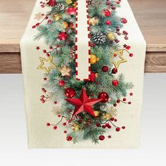 a table runner with christmas decorations on it