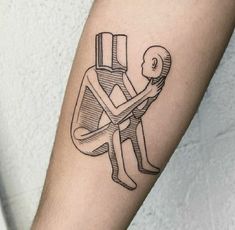 a person with a tattoo on their arm