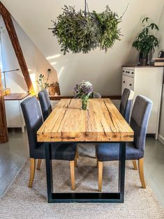 A perfect fusion of old and new, industrial and rustic, this beautiful beams become table that is made using the finest reclaimed wood that's over 100 years old and steel. A solid and soulful piece of organic furniture that has been lovingly handcrafted using the finest reclaimed materials. The wood used in this piece is pine, a fantastic soft wood perfect for furniture building due to it's malleable yet long lasting properties. The wood has been protected with varnish to further prolong the con Organic Furniture, Loft Stil, Furniture Dimensions, Style Loft, Dining Table Black, Style Rustique, Table Black, Black Legs, Style Noir