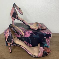 Pink/Black 3in Heels. Opened Toe With Single Strap Across Toes, Strap Around Ankles And Covered Heel. Similar To A Sandal With Heels. Brand New, In Box Never Worn/Used Size 8. Elegant Open Heel Floral Heels, Pink Heels With Heel Strap And Medium Width, Pink Heels With Ankle Strap, Feminine Fitted Heels With Floral Print, Feminine Fitted Floral Print Heels, Fitted Feminine Floral Print Heels, Pink Fitted Ankle Strap Heels, Elegant Ankle Strap Heels With Floral Print, Floral Print Open Toe Heels For Evening