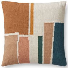 an orange, blue and white pillow with different colored squares on the front is shown