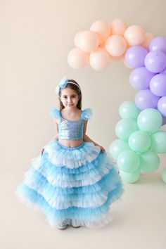 Our skirt, specially made for little princesses, has elasticated waist and lined inside. Their top blouses are lycra and crop cut. Hair accessories are not included. Outfit is suitable for frozen birthday party Fitted Princess Tutu Dress In Glitter Tulle, Fitted Princess Tutu Dress With Glitter Tulle, Fitted Princess Dress With Glitter Tulle Skirt, Party Light Blue Tulle Skirt, Fitted Light Blue Tutu Dress For Party, Fitted Tulle Skirt For Dress-up, Blue Glitter Tulle Princess Dress, Fitted Sequin Princess Dress, Fitted Princess Dress With Tulle Skirt