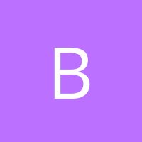 the letter b on a purple background