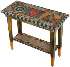 a wooden table with an artistic design painted on it's top and bottom shelf