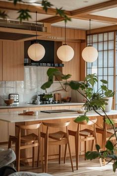 a kitchen filled with lots of wooden furniture and hanging lights over the counter top next to a potted plant