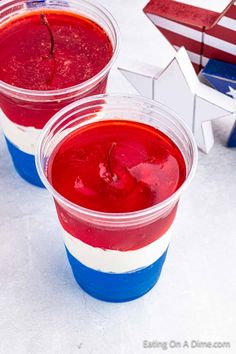 two cups with red, white and blue jello in them