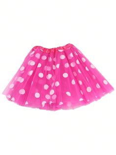 a pink skirt with white polka dots on it