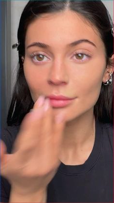 In her episode of Vogue’s Beauty Secrets, Kylie Jenner shares tips for perfect eyeliner and a natural skin-like finish for makeup. Tap to see more.