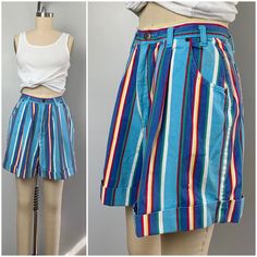 "1990's High Waisted Pleated Shorts. High rise, pleated shorts with blue, red, green, white and yellow stripes. 5 pockets design with wide cuffed legs. Front metal zipper and button closure. Label-no tag but Merona stamp on button Circa-90s Material-no tag but most likely 100% cotton Condition-good. shows minor signs of wear overall with fading women's size-S- shown cinched on a size 2 dress form 33-25-35 high waist-28\" hips 46\" rise-13\" inseam 4 1/2\" thigh 30\" overall length 16\" *all item Black Rain Jacket, Island Wear, Pockets Design, Spring Jackets, Pleated Shorts, Jumpsuit Shorts Rompers, Mom Shorts, Yellow Stripes, Dress Form