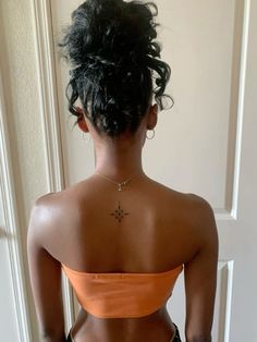 Back On Neck Tattoo, Bottom Neck Tattoo, Star Tattoos Spine, Tigrinya Tattoo, Women Back Neck Tattoo, Below Neck Tattoo, Tattoo On The Back Of The Neck, Sun Moon Back Tattoo, Neck Spine Tattoo