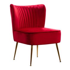 a red velvet chair with gold legs