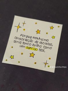 a piece of paper that has writing on it with stars and confetti around it