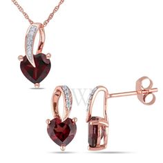 This dainty garnet and diamond heart dangle necklace and earrings set is crafted in lustrous 10-karat rose gold and features heart-cut garnet stones paired with a total of 16 round-cut, pave-set diamonds in a unique loop drop design, perfect for all occasions. Whether worn together or apart, this stunning gemstone and diamond jewelry set is sure to make a standout addition to any jewelry collection. Choose this style either for yourself or as a special gift for someone you love. Diamond Jewelry Set, Dangle Necklace, Drop Design, Dangle Necklaces, Rose Gold Heart, Pendant With Chain, Necklace And Earrings Set, Garnet Stone, Fragrance Gift Set