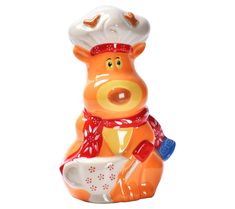 a ceramic pig figurine with a chef hat and apron