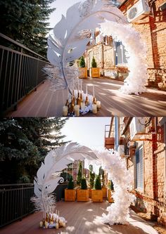 two pictures of a white feather arch on the side of a building with candles and vases