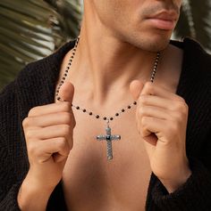 Faith is a very important attribute to positive thinking. The "Profound Belief - Silver Matte Onyx Cross Charm Necklace" symbolizes the inner strength we receive from our faith as we enter new phases of our lives. Matte Onyx stones will encourage compassion for yourself and others and enhance your innate healing abilities. The sacred Cross knows how to put your soul in the needed flow for gaining the traits you've always wanted: altruism, long-lasting faith, and increased empathy. This way, you Black Symbolic Cross Pendant Necklace, Silver Cross Jewelry With Black Beads, Black Symbolic Cross Pendant Jewelry, Symbolic Black Cross Pendant Jewelry, Black Spiritual Jewelry With Oxidized Finish, Spiritual Black Jewelry With Oxidized Finish, Black Spiritual Cross Pendant Jewelry, Black Adjustable Crucifix Necklace, Adjustable Black Crucifix Necklace