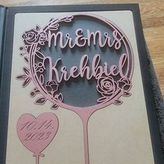 a card with the words mr and mrs krehlelu on it, next to a heart shaped balloon