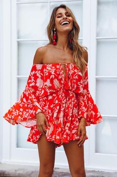 Length from shoulder to hem 58cm. Red playsuit. Not lined. Cold hand wash only. Model is a standard XS and is wearing XS. True to size. Non stretchy fabric. No zipper, slip on style. Print placement may vary. Rayon. Slip into our Made In The Aftermath Playsuit after a long day of lounging poolside or sun baking at the beach! This oversized style has a tie up neckline and waist, wide sleeves and it has a frill hem. We love wearing ours with pool slides and saltwater drenched hair. Red Long Sleeve Jumpsuits And Rompers For Summer, Red One-piece Jumpsuit For Spring, Red Long Sleeve Jumpsuits For Summer, Red Fitted Jumpsuits And Rompers For Vacation, Red Jumpsuits And Rompers For Spring Beach Outings, Red Jumpsuits And Rompers For Beach In Spring, Fitted Red Jumpsuits And Rompers For Vacation, Red Fitted Jumpsuit For Vacation, Red Jumpsuits And Rompers For Summer Day Out