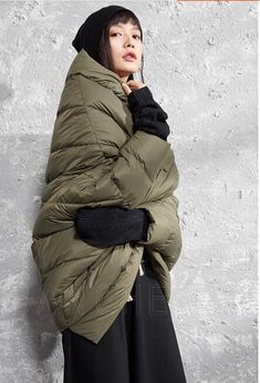 This down coat make with 90% duck down ,very warm in the winter .also have plus size to 10 XL. This is a winter down jacket fill with down.we design it with a very thick and warm style.this hooded down jacket could keep you very warm in the cold winter.the side pockets is very useful.a unique design women winter coat. Material: 90% duck down ,polyester Style: Casual Package Contents: 1 x down coat Free Size: Length:120cm chest:140cm shoulder and sleeve:68cm