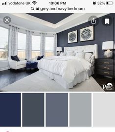 a bedroom with blue walls, white furniture and gray curtains on the window sill