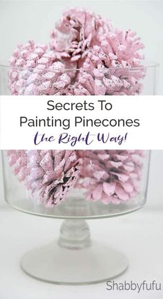 pink flowers in a glass vase with the words secrets to painting pinecones the right way