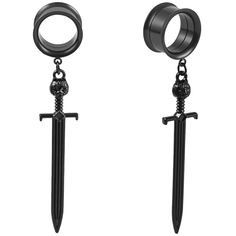 a pair of black swords hanging from hooks