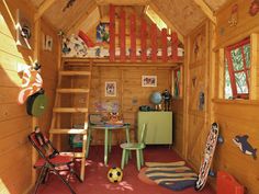 there is a loft bed in the room with bunk beds and ladders on the wall