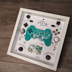 a close up of a video game controller in a frame