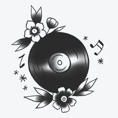 an old record with flowers and music notes on the side, in black and white