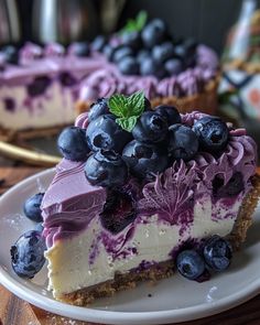 a slice of blueberry cheesecake on a plate