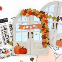 an image of a happy fall card with leaves and pumpkins on the front door