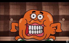 an orange cartoon character with large teeth and big eyes, sitting on a checkered wall