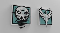 two pieces of artwork on the wall, one with an evil face and another with a spooky mouth