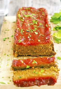 two slices of meatloaf on a cutting board