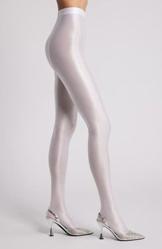 Sleek and shiny tights are made from lustrous stretch fabric to add a contemporary, fashion-forward look to any ensemble. Polyester/spandex Hand wash, dry flat Imported White Stockings, Stocking Tights, Womens Tights, Fabric Gift Bags, Fabric Gifts, Free Fabric, Contemporary Fashion, Polyester Spandex, High Heel