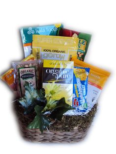 a basket filled with lots of different types of food and snacks on top of a table