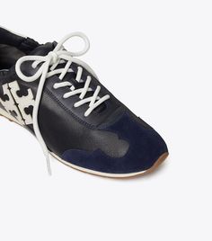 Tory Golf Sneaker: Women's Designer Sneakers | Tory Sport Sporty Custom Sneakers With Leather Sole, Sporty Low-top Golf Shoes With Laces, Sporty Lace-up Golf Shoes With Rubber Sole, Sporty Leather Golf Shoes, Bowling Shoes, Track Shoes, T Logo, Golf Attire, Golf Skirts