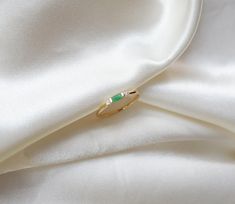 14k gold jadeite ring, 14k jade baguette ring, Baguette jade ring, Dainty jade ring, 14k gold dainty jadeite ring, Stackable green jade ring ✦ Product Features: ● Made to order ● Materials: Solid Gold ● Gold Kt: 9K, 10K, 14K, 18K ● Gold color: Rose Gold, White Gold, and Yellow Gold ● Setting: Natural Green Burmese Jade (Please kindly be noted that, due to the natural differences of jade stone, the natural color of baguette jade will be varied piece by piece in consideration of its natural beauti Green Jade Ring, Jadeite Ring, Swiss Blue Topaz Ring, Ring Baguette, Gold Amethyst Ring, Burmese Jade, Emerald Ring Gold, Baguette Ring, Ring Stack