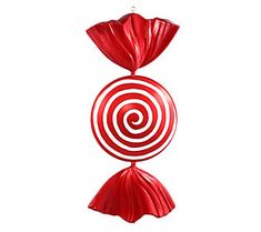 a large red and white lollipop with swirls hanging from it's sides