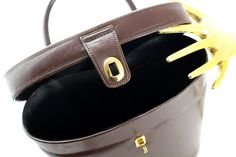 The cute XL lunchbox brown leather bag will accentuate any outfit. Ample room to hold your belongings. Soft brown leather on the outside and black fabric on the inside. Brown leather top handle and latch closure. This bag has not been used. It is a prototype of designer. Ref: B0524 Condition: Near Mint Size: 29cm L X 22,5cm H X 13cm D More vintage handbags in my online shop: http://www.vintagecarwen.com Brown Bucket Box Bag For Formal Occasions, Formal Brown Bucket Box Bag, Vintage Top Handle Box Bag For Office, Vintage Leather Box Bag For Office, Lunchbox Bag, Brown Leather Top, Lunch Box Bag, Top Handle Bags, Brown Leather Bag