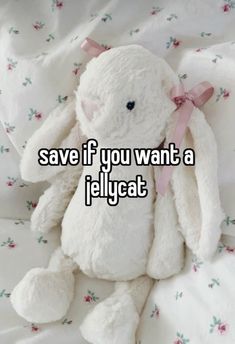 a white stuffed animal sitting on top of a bed with the words save if you want a